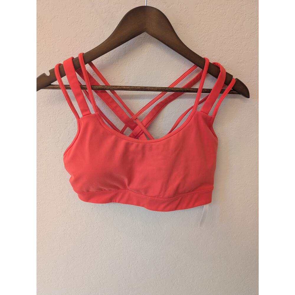 NWOT Victoria Sports Bra w criss cross straps coral Sz L